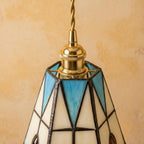 Handmade Cream Bell Tiffany-Inspired Pendant Light with Blue Triangles and Amber-tone Oval Details - view 4