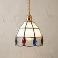 Handmade Cream Faceted Bell Tiffany-Inspired Pendant Light with Red, Blue, and Amber-tone Ovals by AuroraeGlass